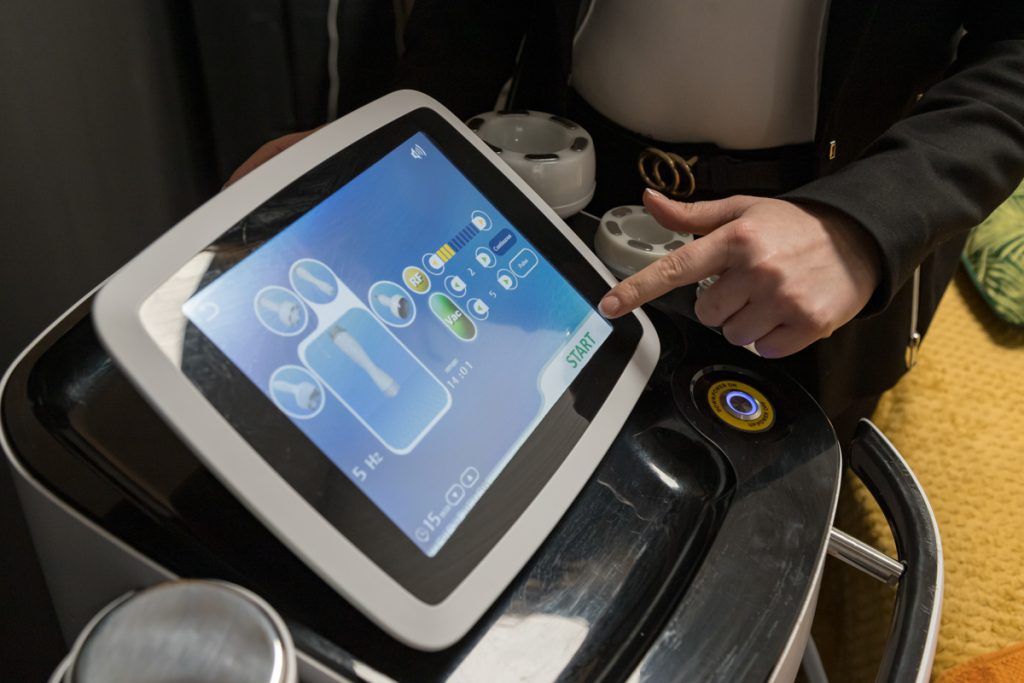 Female hand operating screen