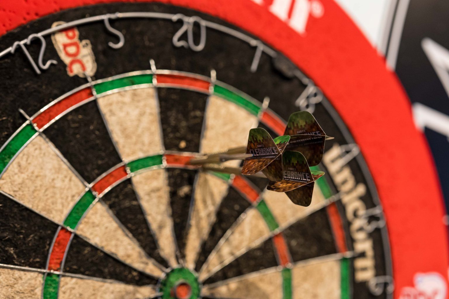 Darts in dartboard