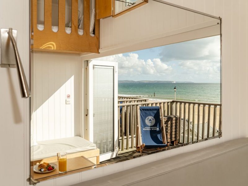 Picture taken in a mirror of a property looking over the sea