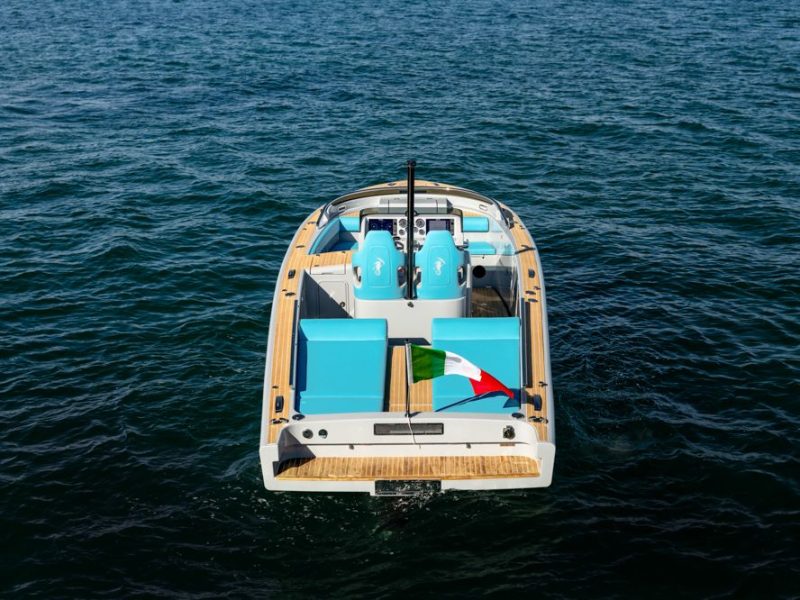 Top down image of an Italian boat with bright blue interior